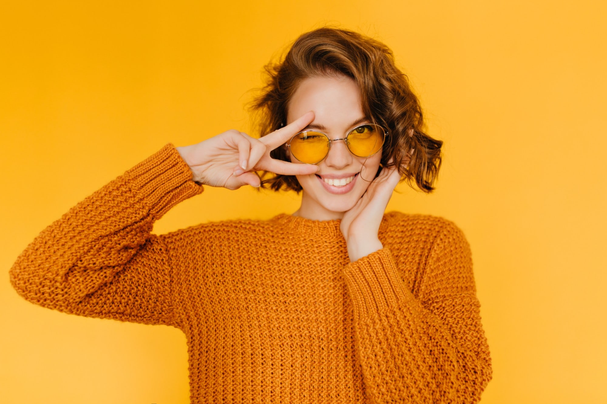 smiling patient with clear aligners in noblesville